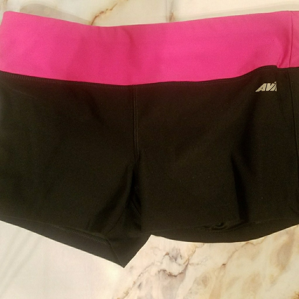 Never-worn neon pink and black running shorts.